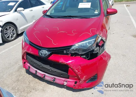 2018 Toyota Corolla Le z USA, uszkodzony, nr VIN 5YFBURHE4JP847127
